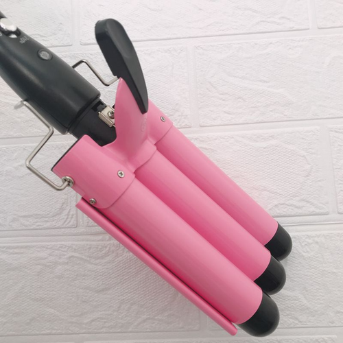 Babyliss Triple Barrel Curling Iron.